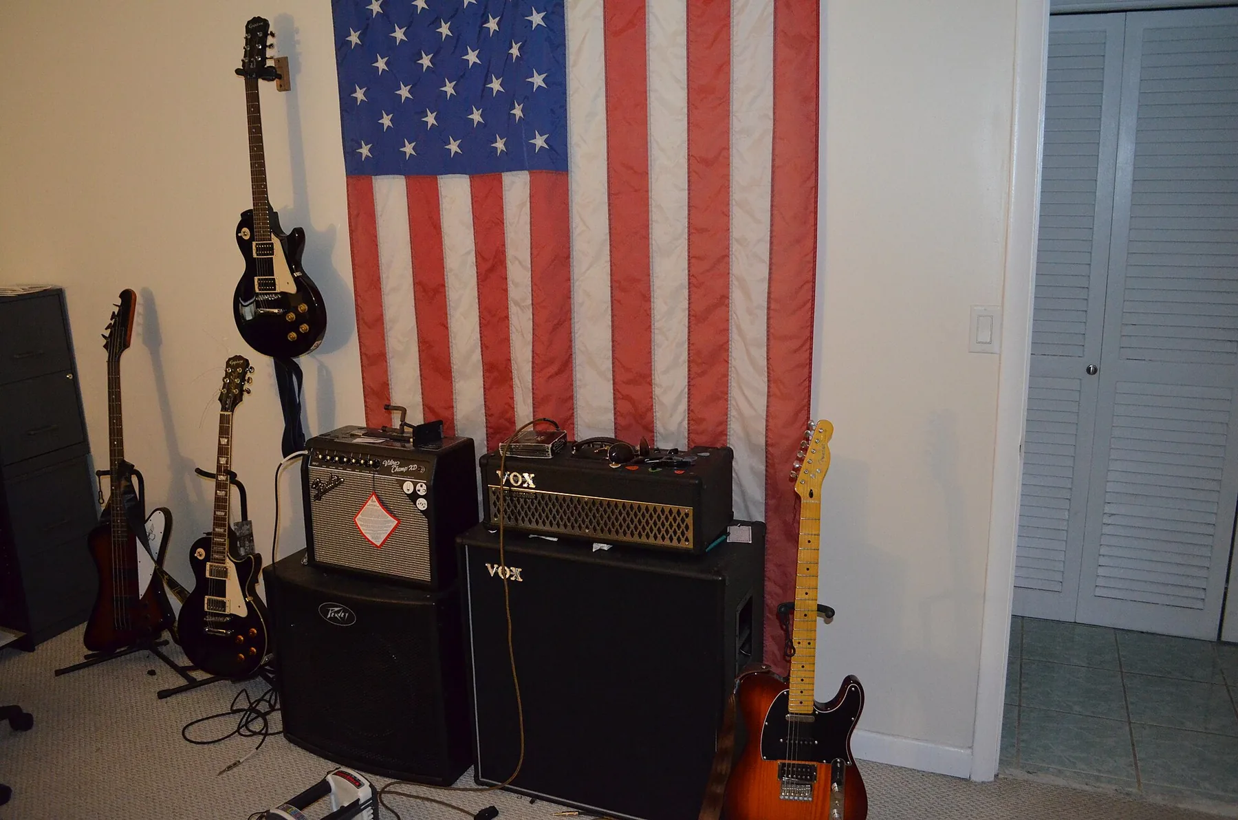 guitars on stands for folk music