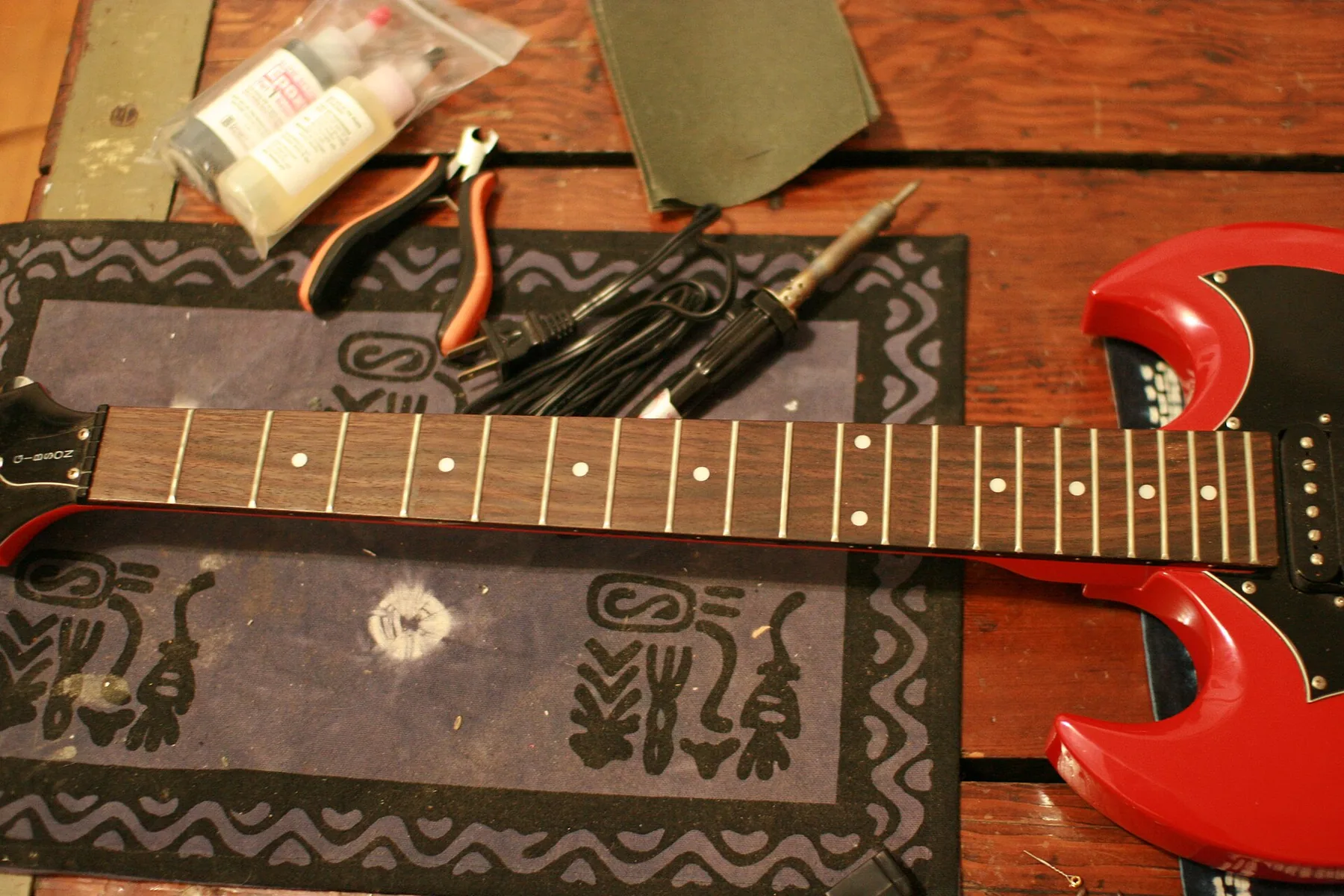 Guitar neck with tools Guitar neck with tools